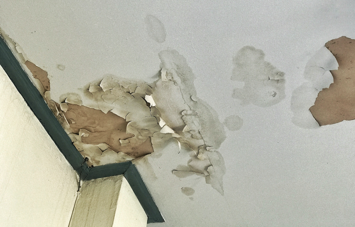 water damage on ceiling that is causing peeling